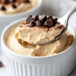 Cottage Cheese Peanut Butter Mousse: 5-Minute, High-Protein Dessert You’ll Love 2 Spoonful of creamy cottage cheese peanut butter mousse topped with chocolate chips and cocoa powder in a white ramekin.